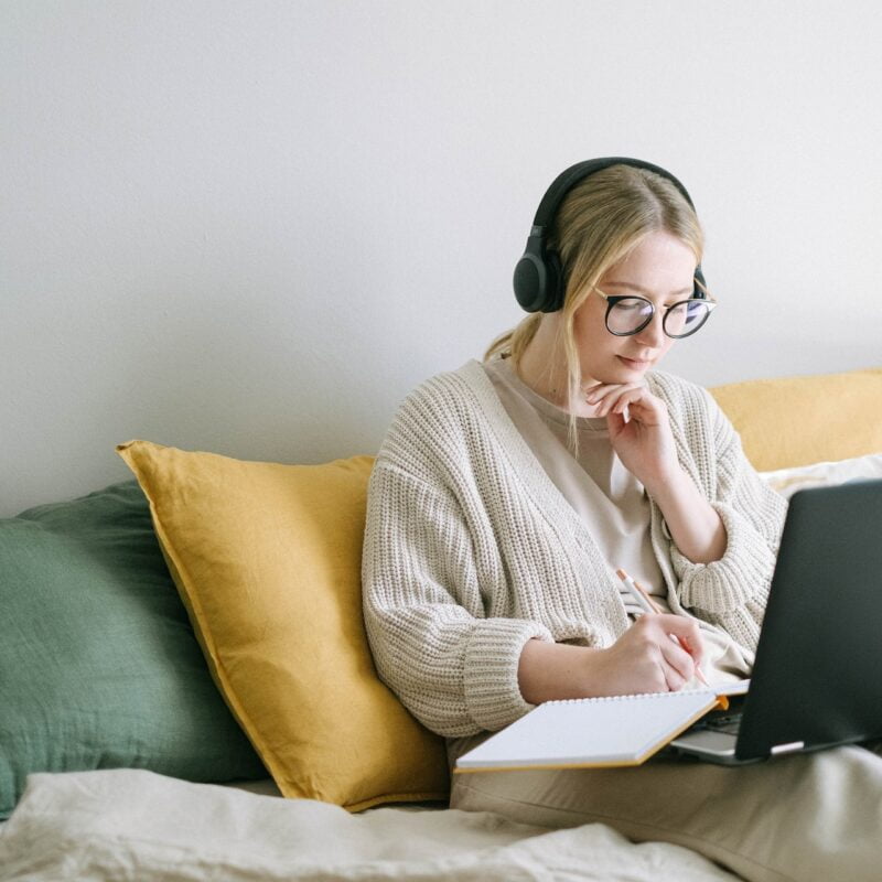 Person works while listening to music